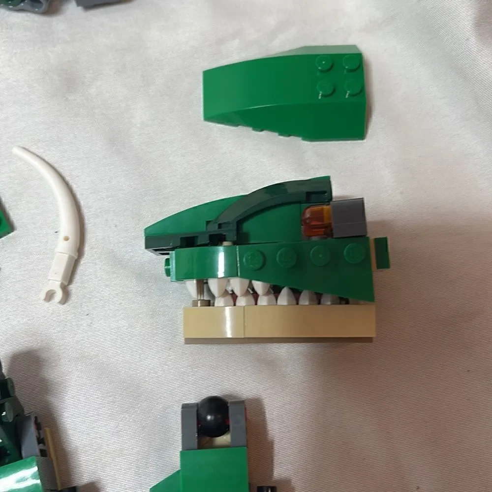 Lego Creator 3 in 1 Mighty Dinosaur Pieces.